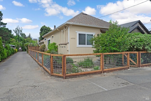 215 Iowa St, Santa Rosa, CA 95401 - view of property exterior featuring fence and a shingled roof