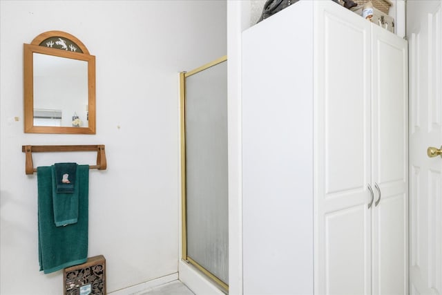 bathroom featuring a stall shower