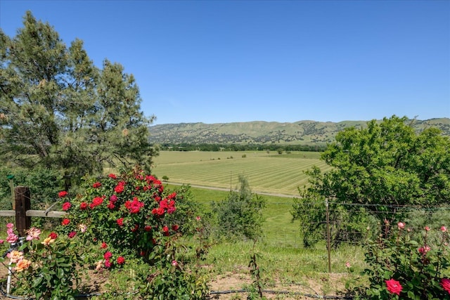 property view of mountains featuring a rural view