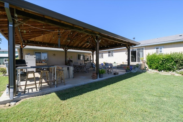 view of yard featuring a patio area and a gazebo