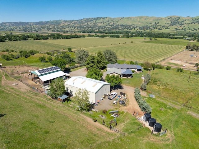 drone / aerial view with a rural view and a mountain view