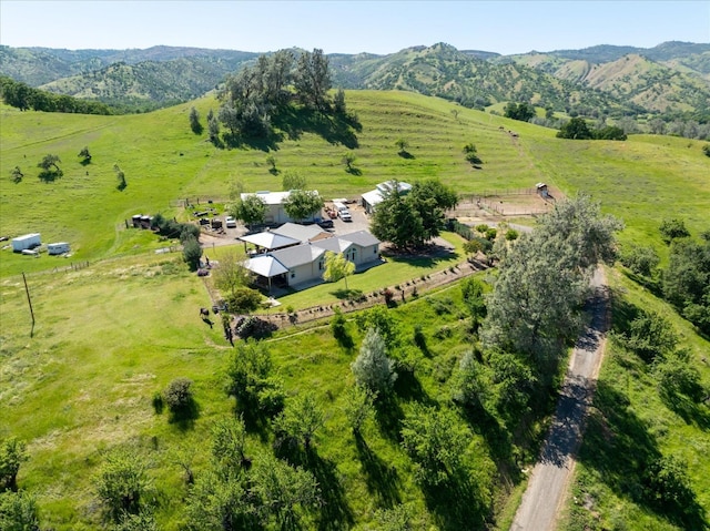 bird's eye view featuring a mountain view and a rural view