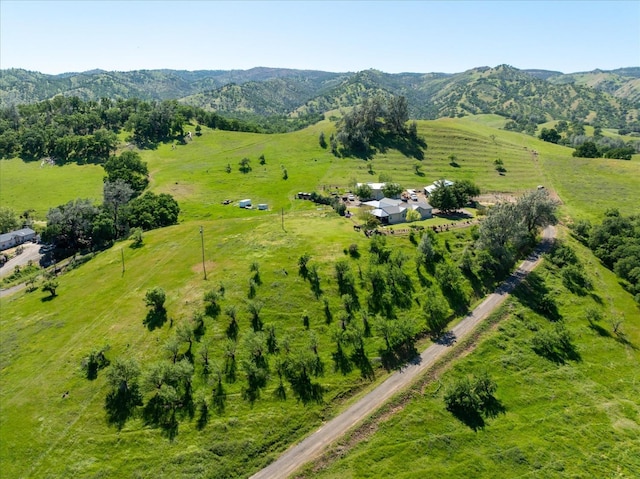 bird's eye view featuring a mountain view and a rural view