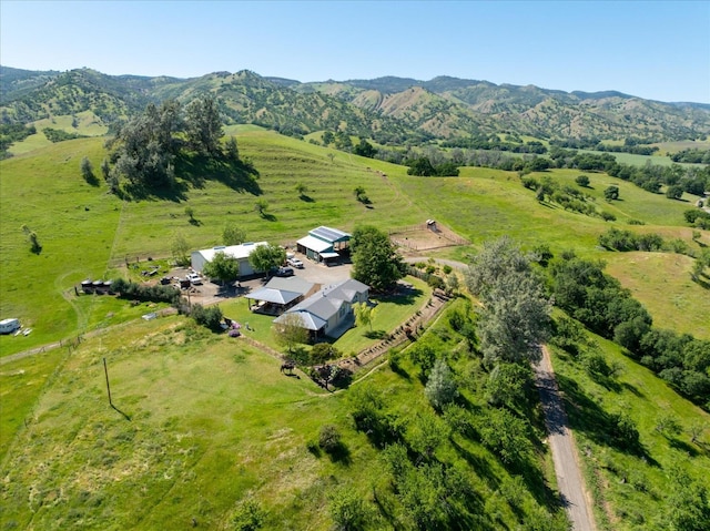 drone / aerial view with a rural view and a mountain view