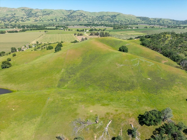 bird's eye view with a rural view and a mountain view