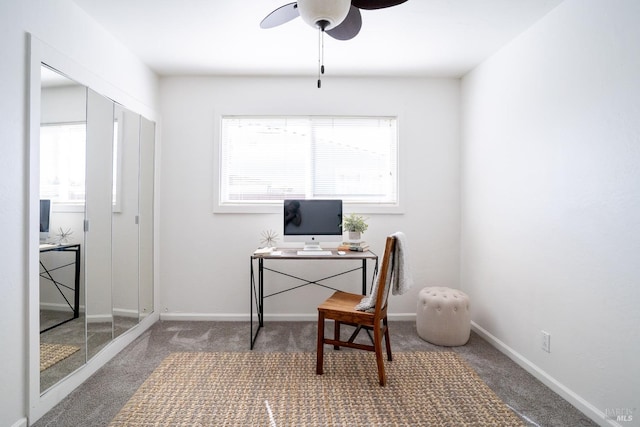 office with plenty of natural light, a ceiling fan, and carpet