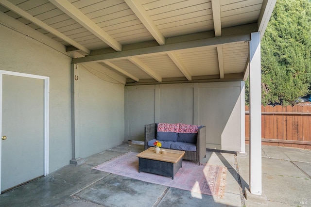view of patio / terrace with fence and an outdoor hangout area