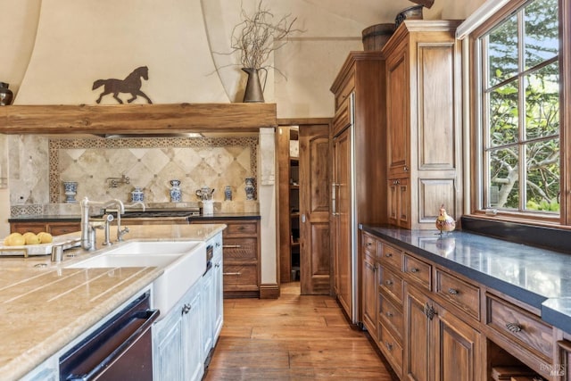 1571 Silver Trl, Napa, CA 94558 - kitchen featuring tasteful backsplash, a sink, light wood-type flooring, dishwasher, and a healthy amount of sunlight