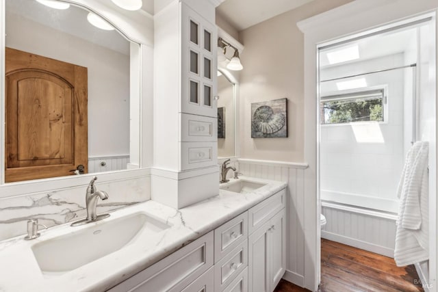 1571 Silver Trl, Napa, CA 94558 - bathroom with wainscoting, wood finished floors, a sink, and toilet
