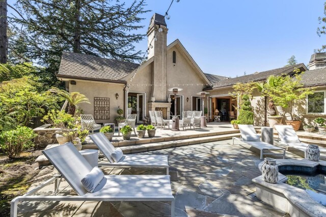 1571 Silver Trl, Napa, CA 94558 - back of property with stucco siding, a patio area, and a chimney
