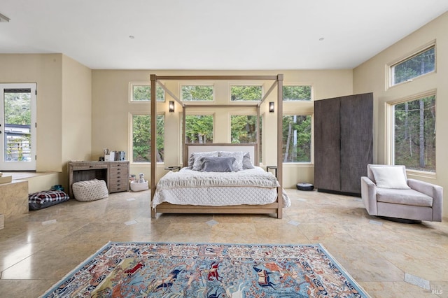 bedroom featuring multiple windows