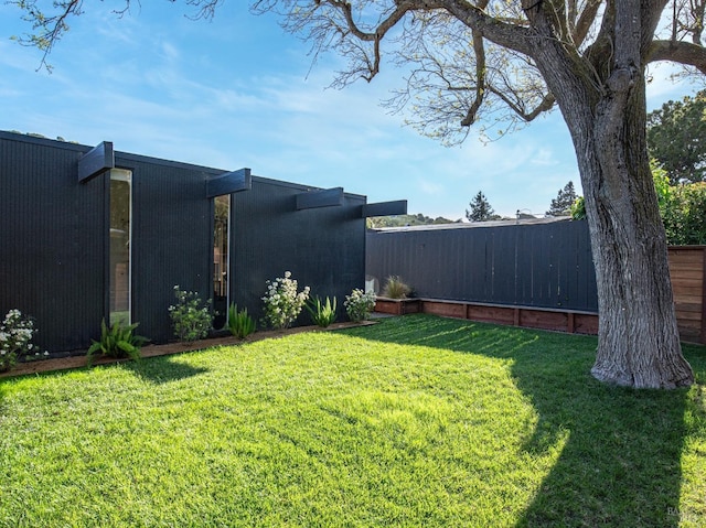 view of yard with fence