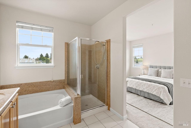 ensuite bathroom with a garden tub, tile patterned flooring, connected bathroom, and a stall shower