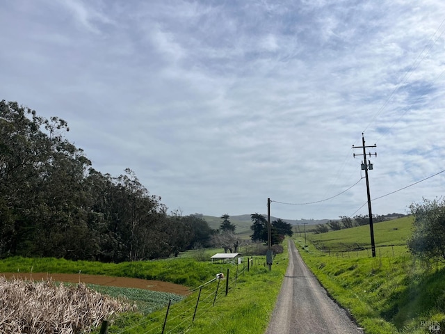 view of street featuring a rural view