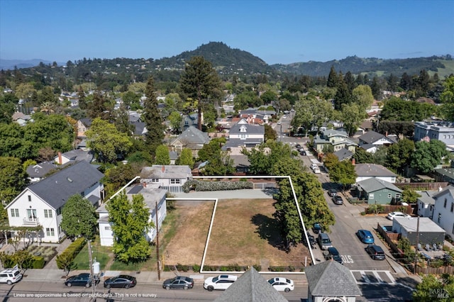 bird's eye view featuring a mountain view and a residential view