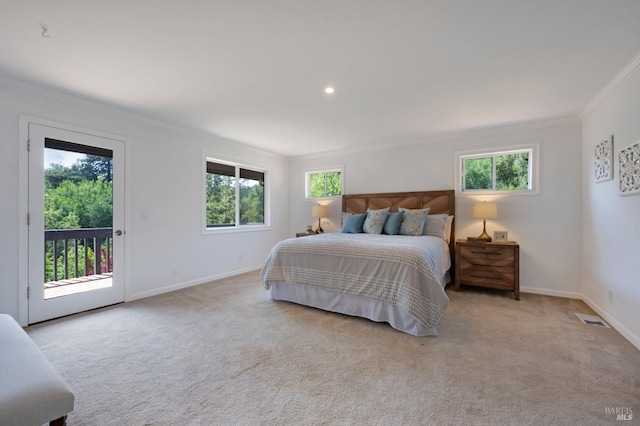 bedroom featuring carpet floors, ornamental molding, visible vents, baseboards, and access to outside