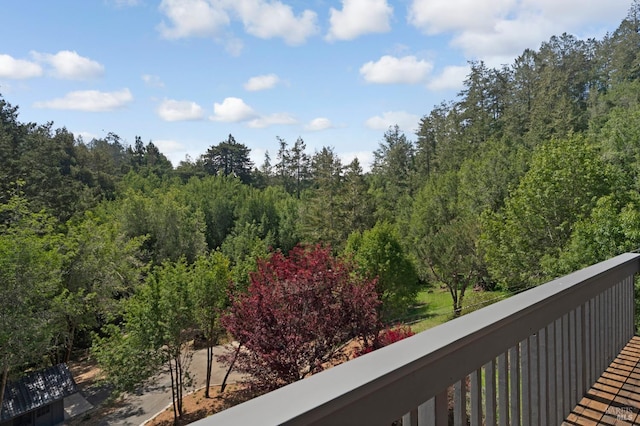 balcony with a forest view