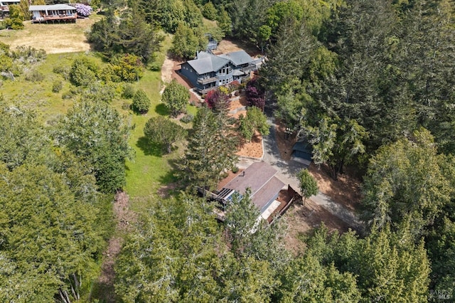 aerial view featuring a view of trees