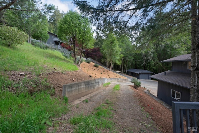 view of road with driveway