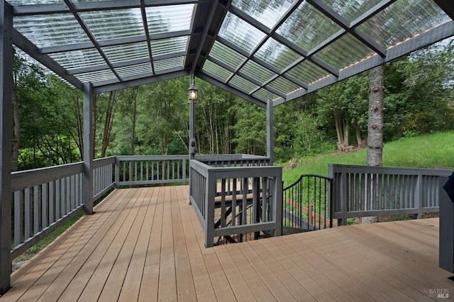 wooden deck featuring a pergola