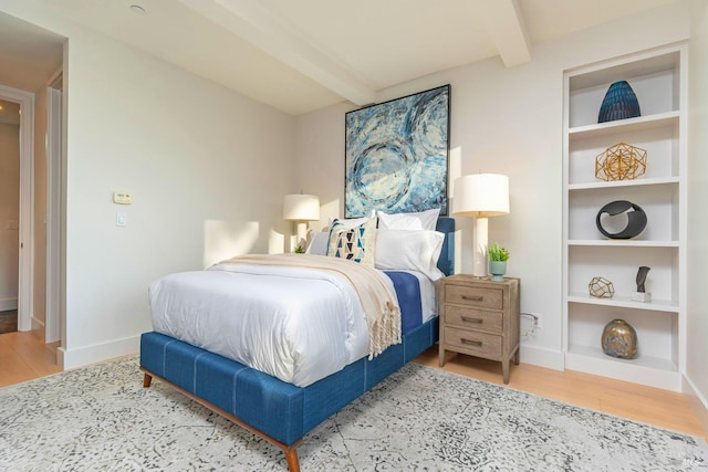 86 Sugarloaf Dr, Tiburon, CA 94920 - bedroom featuring beam ceiling, wood finished floors, and baseboards