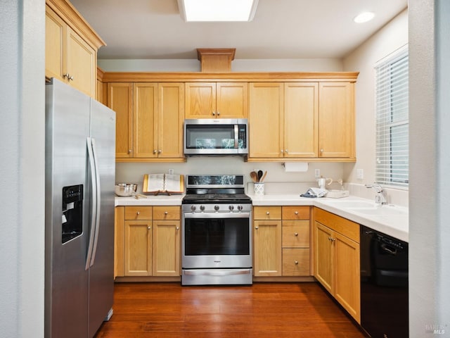 2342 Bell Flower Ln, Santa Rosa, CA 95404 - kitchen featuring appliances with stainless steel finishes, light countertops, dark wood-style floors, and light brown cabinets
