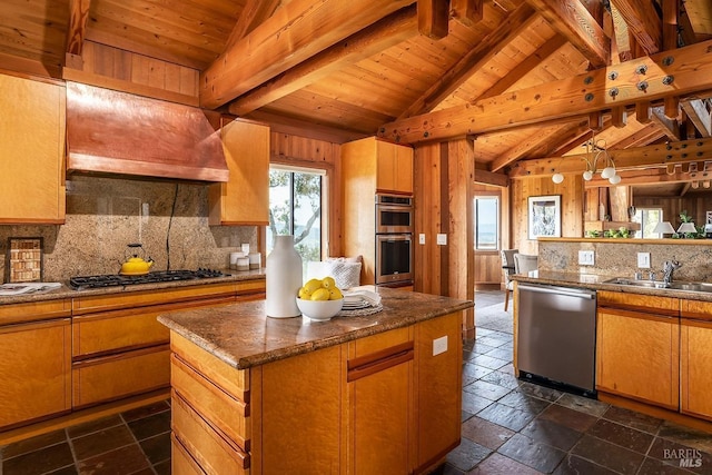 kitchen with backsplash, a healthy amount of sunlight, lofted ceiling with beams, and stainless steel appliances