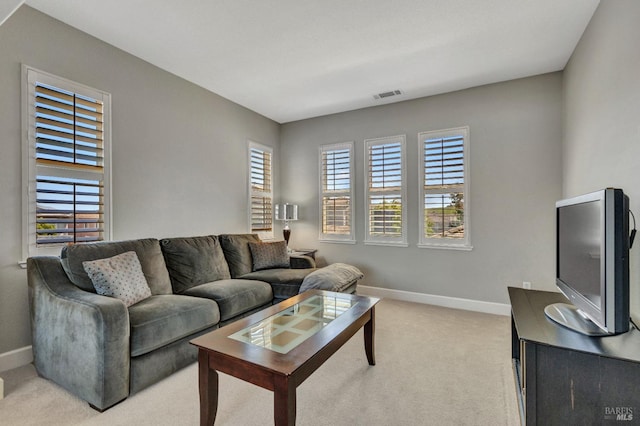 439 Mckenna Ct, Benicia, CA 94510 - living area featuring light carpet, visible vents, and baseboards