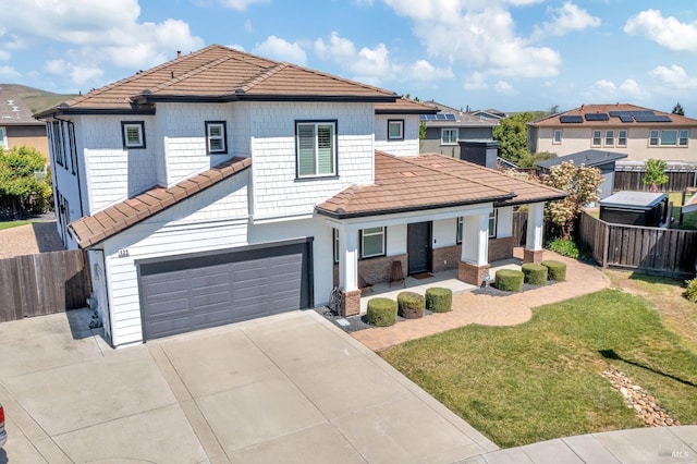 439 Mckenna Ct, Benicia, CA 94510 - view of front of home featuring fence, driveway, covered porch, a front yard, and a garage
