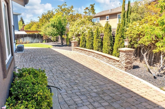 439 Mckenna Ct, Benicia, CA 94510 - view of patio with central air condition unit and a fenced backyard