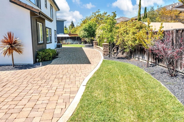 439 Mckenna Ct, Benicia, CA 94510 - view of yard with a fenced backyard, cooling unit, and a patio