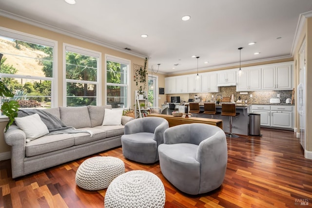 living room featuring recessed lighting, crown molding, and dark wood-type flooring