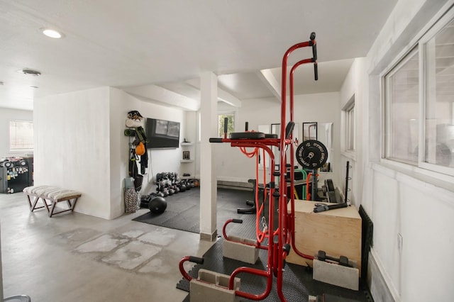 workout room featuring recessed lighting and plenty of natural light