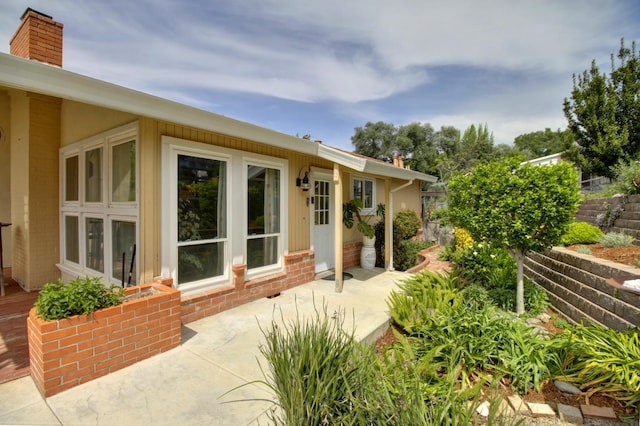 7600 Scenic Ct, Fair Oaks, CA 95628 - doorway to property featuring a chimney
