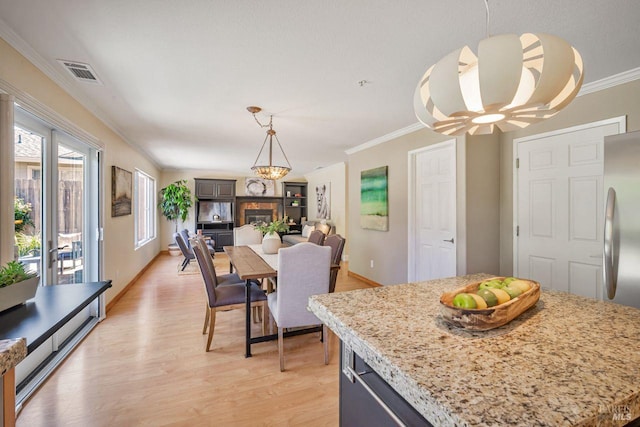 119 Philip Dr, Healdsburg, CA 95448 - dining area featuring ornamental molding, light wood finished floors, and baseboards