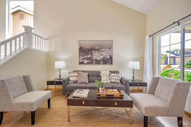 119 Philip Dr, Healdsburg, CA 95448 - living area with high vaulted ceiling, baseboards, and wood finished floors
