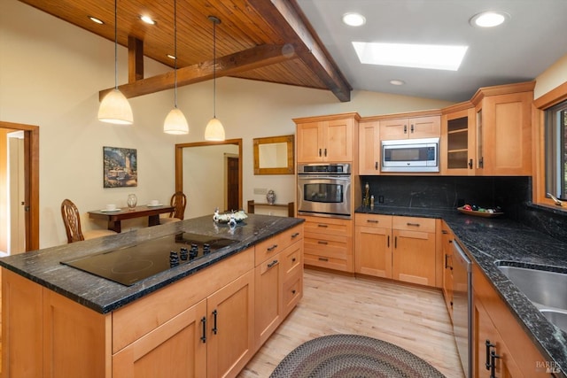 149 Auburn Way, Vacaville, CA 95688 - kitchen with vaulted ceiling with skylight, decorative backsplash, appliances with stainless steel finishes, glass insert cabinets, and light wood-style flooring