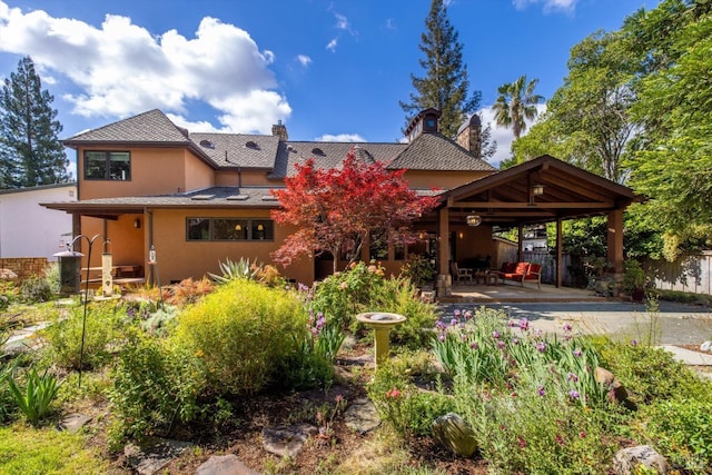 149 Auburn Way, Vacaville, CA 95688 - view of front facade with fence, stucco siding, a chimney, concrete driveway, and a patio