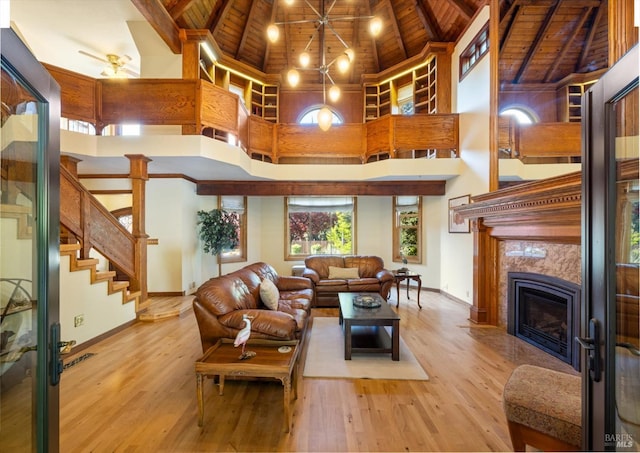 149 Auburn Way, Vacaville, CA 95688 - living area featuring wooden ceiling, baseboards, high vaulted ceiling, and wood finished floors