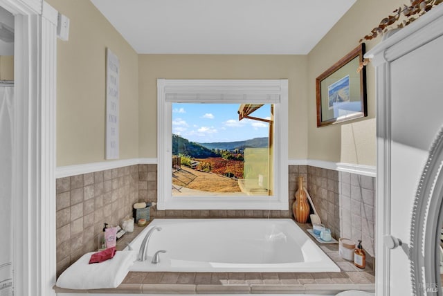 bathroom with a garden tub