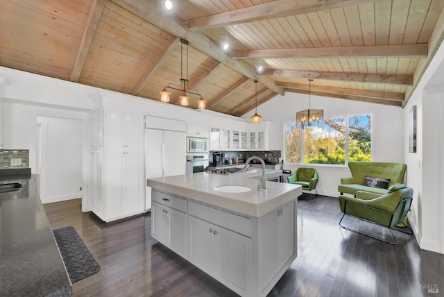 kitchen with vaulted ceiling with beams, an inviting chandelier, wooden ceiling, backsplash, and appliances with stainless steel finishes