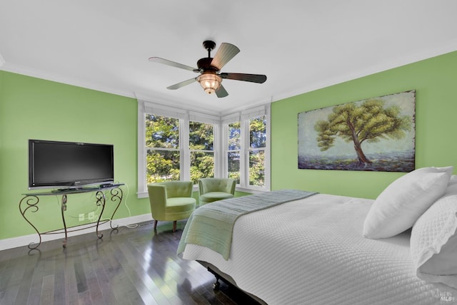 bedroom featuring ceiling fan, baseboards, and hardwood / wood-style floors