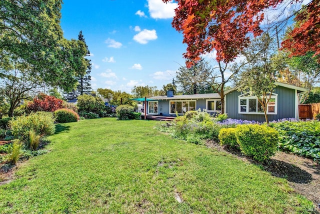 view of yard with fence