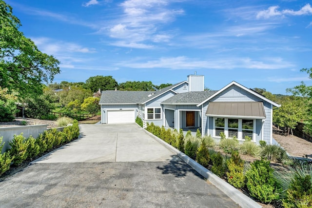 12 Rose Ct, Novato, CA 94945 - single story home featuring a garage, concrete driveway, and board and batten siding