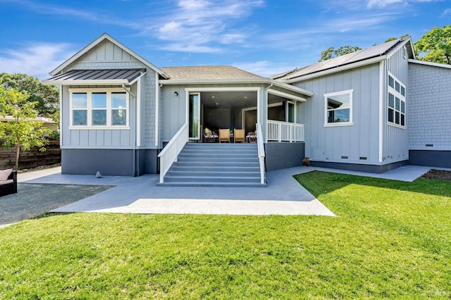 12 Rose Ct, Novato, CA 94945 - back of house with board and batten siding, a patio, and a yard