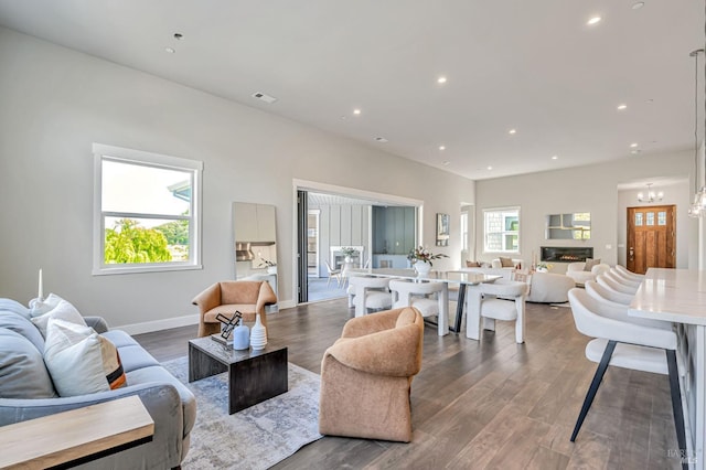 12 Rose Ct, Novato, CA 94945 - living room featuring wood finished floors, recessed lighting, a chandelier, and baseboards