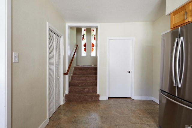 stairway with baseboards