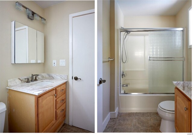 bathroom with baseboards, combined bath / shower with glass door, toilet, and vanity