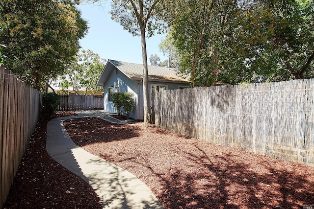 view of yard featuring a fenced backyard