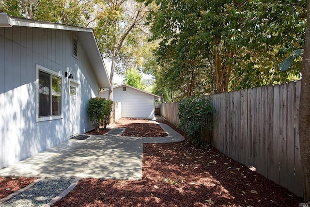 view of yard with a fenced backyard and a patio